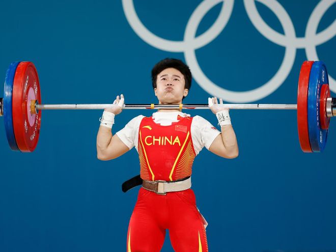 奥运举重比赛冠军_举重奥运冠军张国侠_奥运举重冠军男