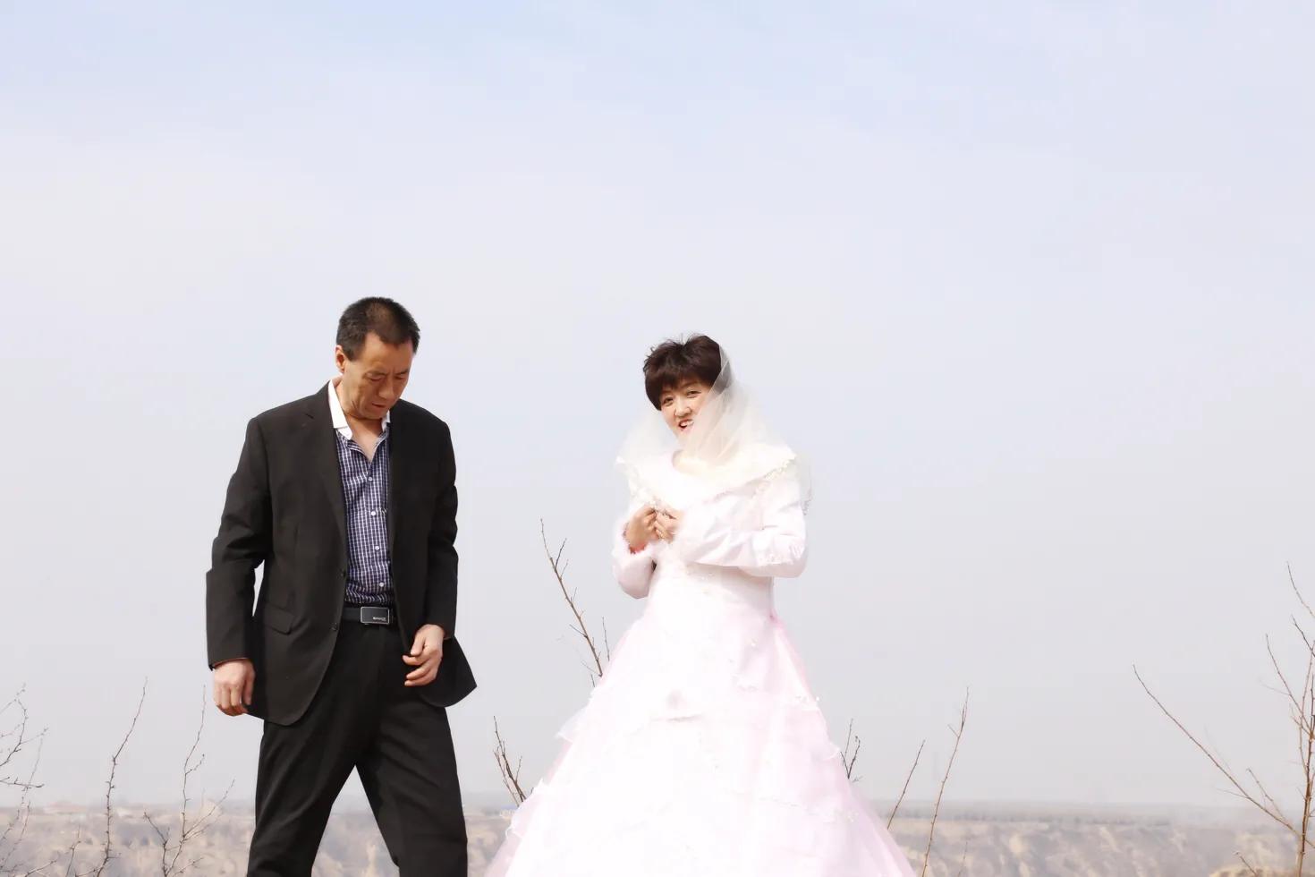 跟父母同拍婚纱照_拍婚纱照带父母_拍婚纱照父母要干涉吗