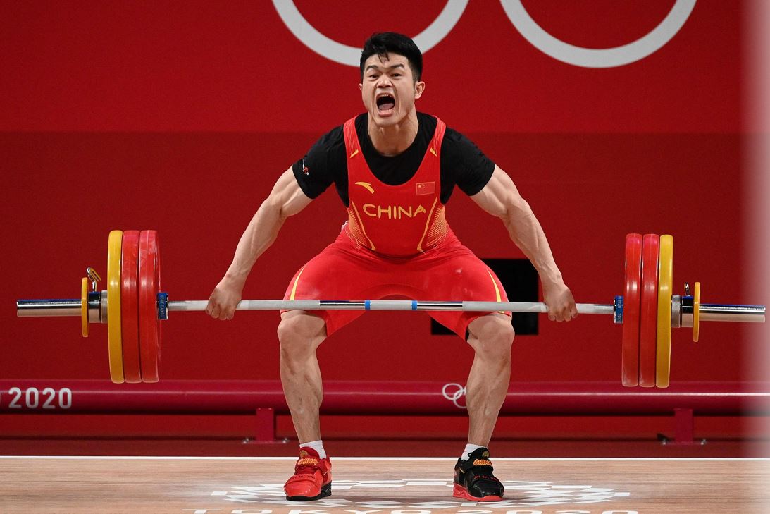 举重男子世界冠军_中国男举重世界冠军_举重冠军男2021